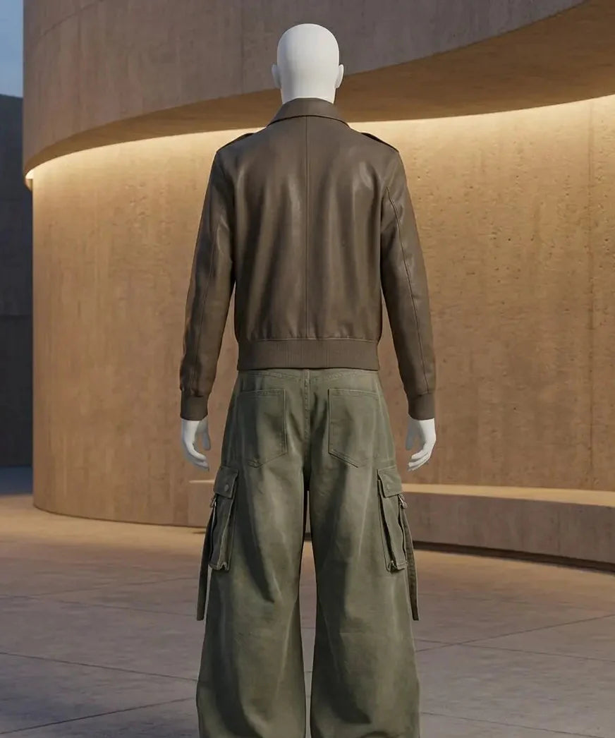 Mannequin wearing a brown jacket and green cargo pants in an indoor setting.