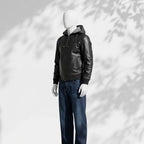 Mannequin wearing a black leather jacket and blue jeans on a white background