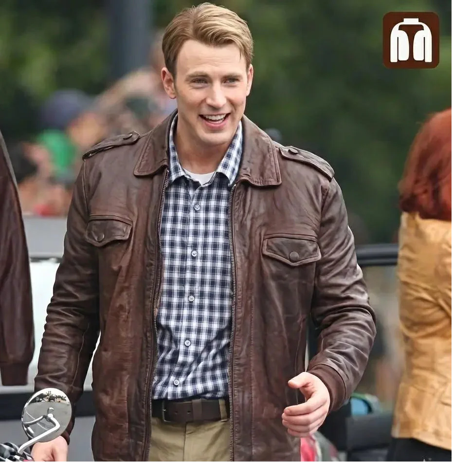 Man wearing a brown leather jacket and plaid shirt outdoors